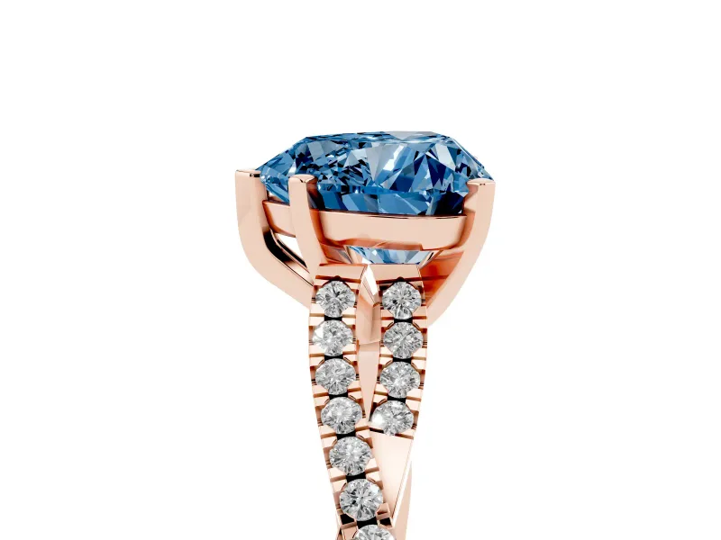 Fancy Blue Heart Cut Diamond Solitaire Engagement Ring Set in Rose gold with Twisted Pavé Band and Prong Setting