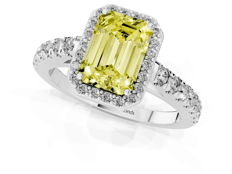 Fancy Yellow Emerald Cut Diamond Halo Engagement Ring Set in Silver with Pavé Band and Prong Setting