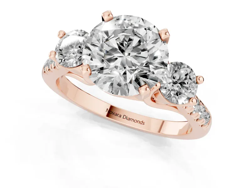 Three-Stone Round Cut Diamond Pavé Band Ring Set in Rose gold with Prong-Set Trio