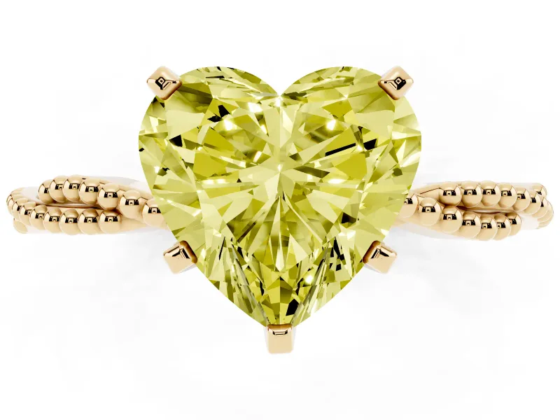 Fancy Yellow Heart Cut Diamond Solitaire Ring Set in Yellow gold with Twisted Band and Bead Prong Setting