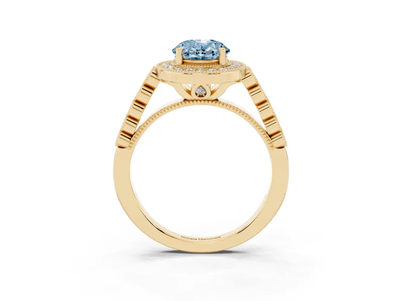 Fancy Blue Oval Cut Diamond Milgrain Halo Solitaire Ring Set in Yellow gold with Bezel Set Side Stones and Pavé Band