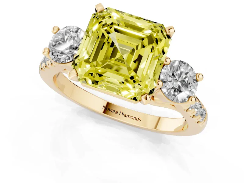 Fancy Yellow Three-Stone Asscher Cut Diamond Pavé Band Ring Set in Yellow gold with Prong-Set Trio