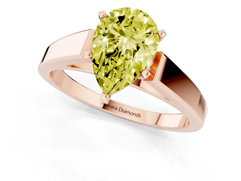 Fancy Yellow Pear Cut Diamond Solitaire Engagement Ring Set in Rose gold with Prong Setting and Tapered Band