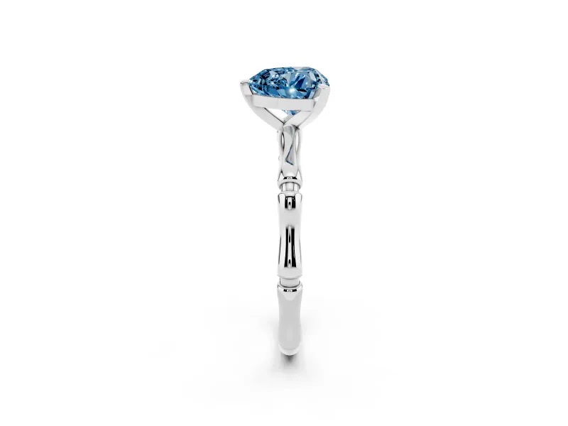 Fancy Blue Heart Cut Diamond Solitaire Ring Set in Silver with Bamboo Band and Prong Setting