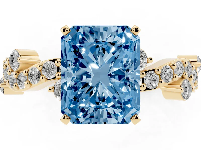 Fancy Blue Radiant Cut Diamond Solitaire Twisted Band Set in Yellow gold with Pavé Setting
