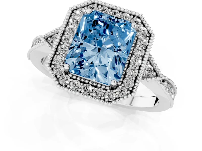 Fancy Blue Radiant Cut Diamond Halo Engagement Ring Set in White gold with Milgrain Pavé Band