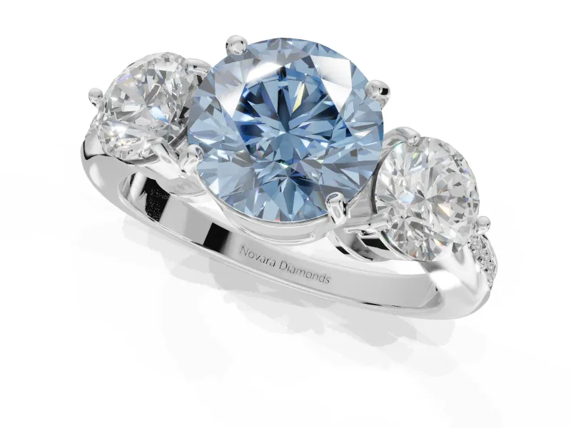 Round Three Stone Engagement Ring Setting for a Fancy Blue Lab-Grown Diamond | Tapered Pave Band | Platinum