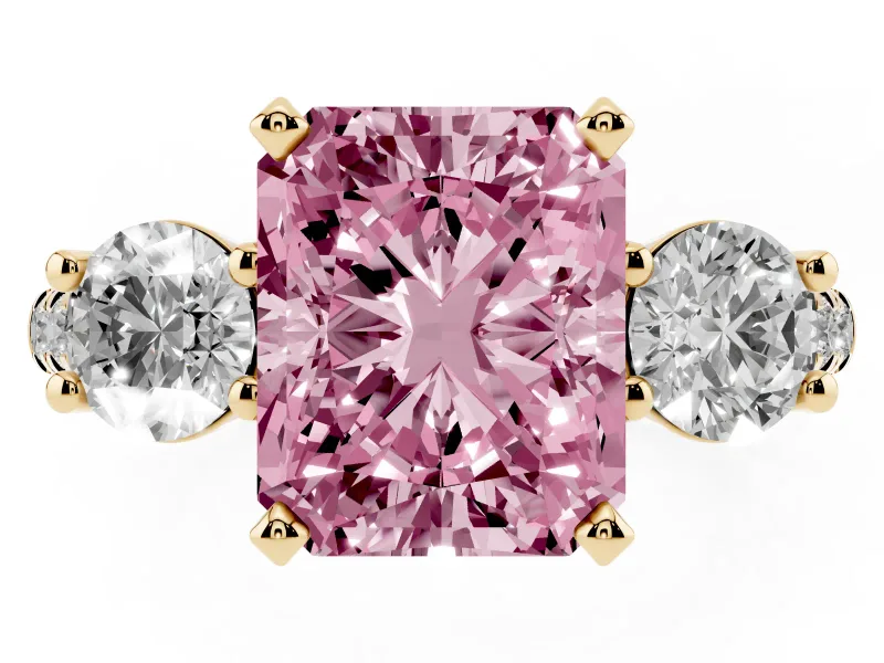 Fancy Pink Three-Stone Radiant Cut Diamond Pavé Band Ring Set in Yellow gold with Prong-Set Trio