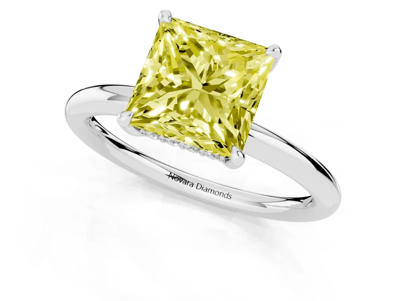 Fancy Yellow Princess Cut Diamond Solitaire Ring Set in White gold with Thin Band and Prong Setting
