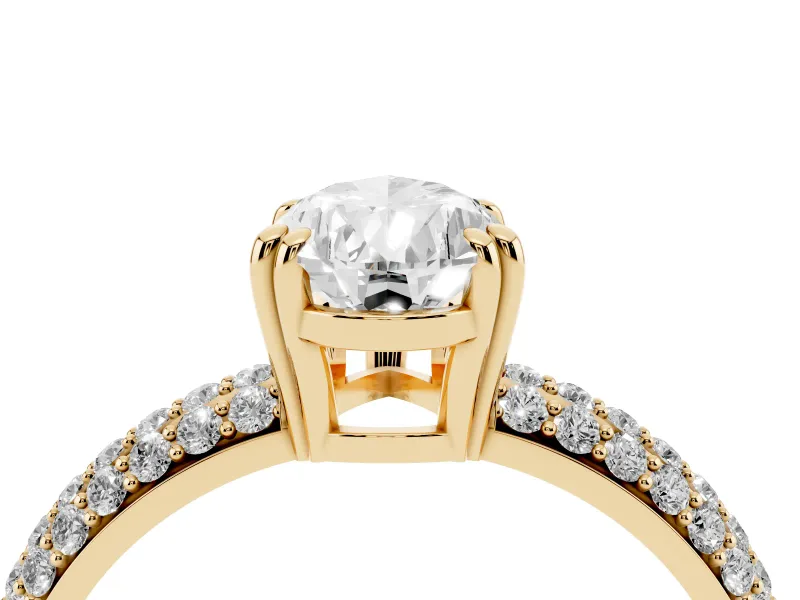 Pear Cut Diamond Solitaire Ring Set in Yellow gold with Multi-Row Round Pavé Band and Prong Setting