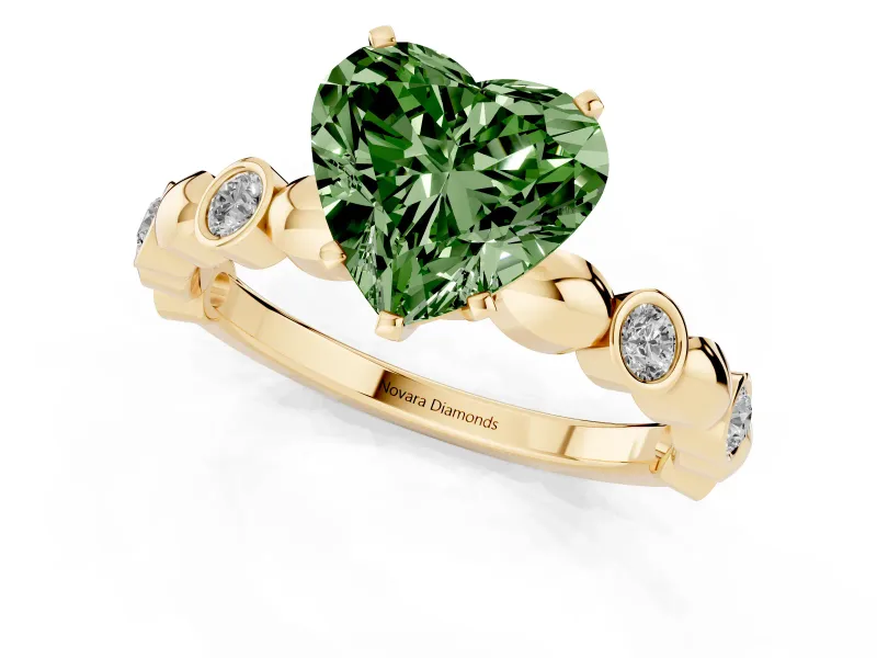 Fancy Green Heart Cut Diamond Solitaire Ring Set in Yellow gold with Bezel-Set Accents on Beaded Band and Prong Setting