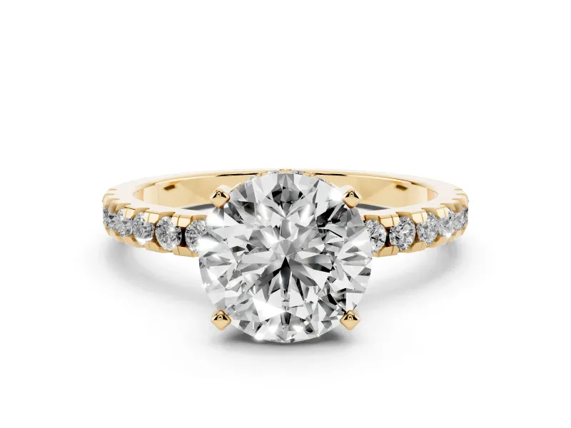 Round Cut Diamond Pavé Solitaire Ring Set in Yellow gold with Round Band Accents and Prong Setting