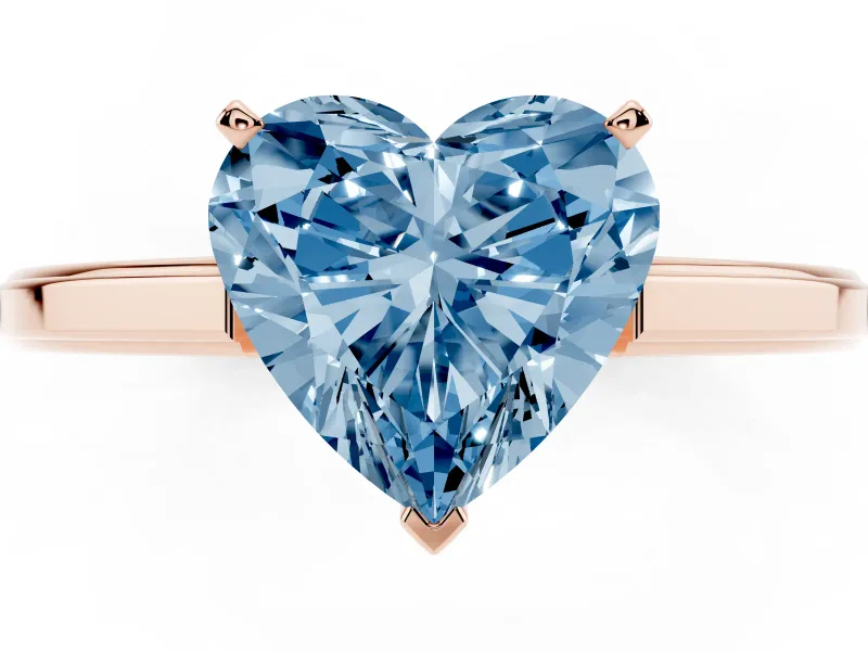 Fancy Blue Heart Cut Diamond Solitaire Ring Set in Rose gold with Prong Setting and Classic Band
