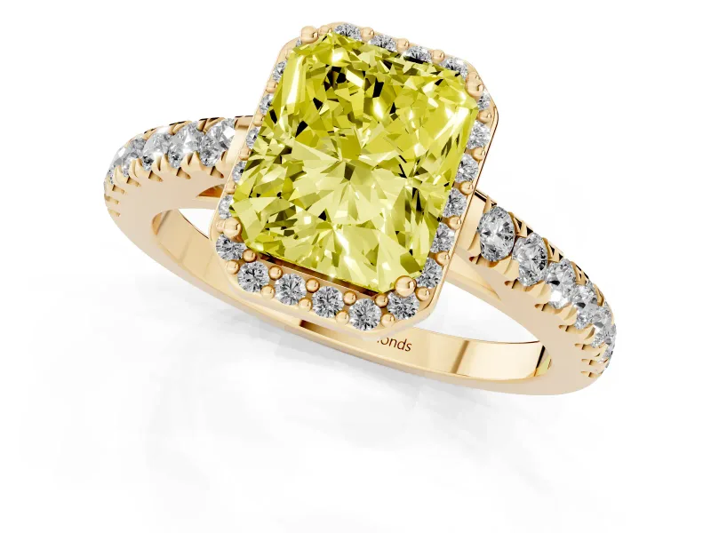 Fancy Yellow Radiant Cut Diamond Halo Engagement Ring Set in Yellow gold with Pavé Band and Prong Setting