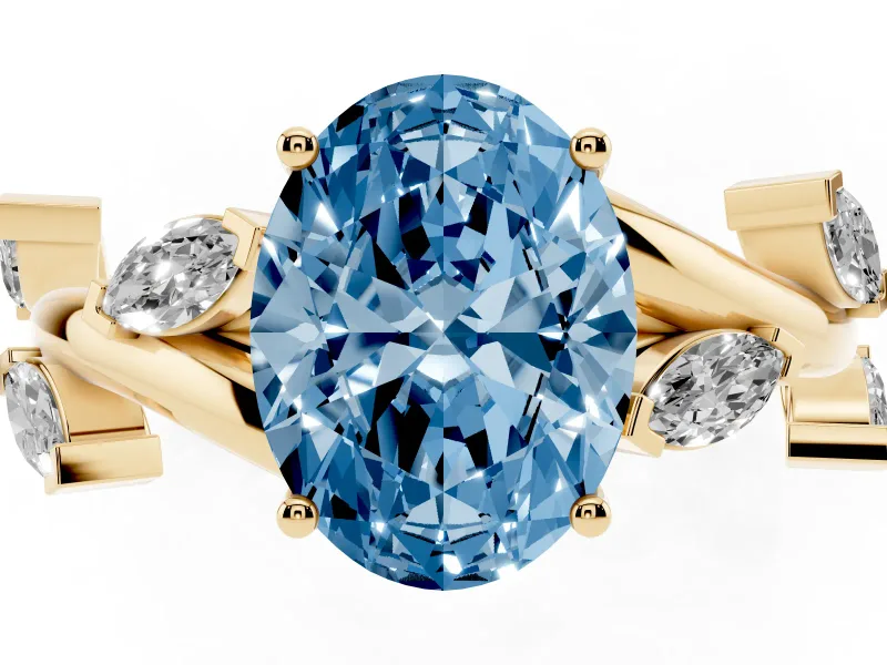 Fancy Blue Oval Cut Diamond Solitaire Ring Set in Yellow gold with Twisted Marquise Accent Band