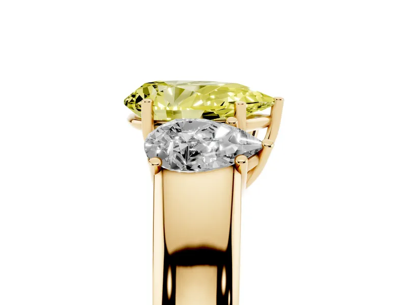 Fancy Yellow Three-Stone Pear Cut Diamond Ring Set in Yellow gold with Matching Prong Settings and Plain Band