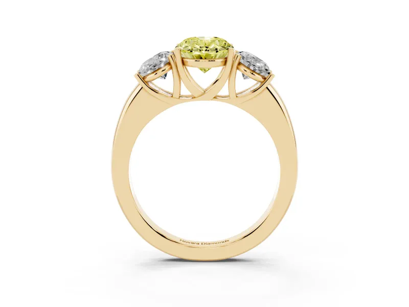 Fancy Yellow Oval Cut Diamond Three-Stone Ring Set in Yellow gold with Bold Center and Classic Band