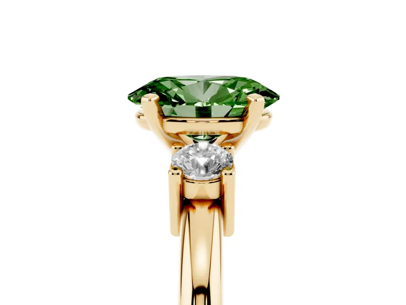 Fancy Green Three-Stone Oval Cut Diamond Ring Set in Yellow gold with Prong Setting and Plain Band