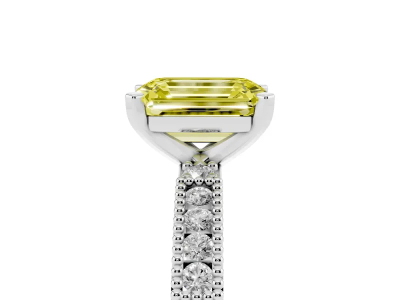 Fancy Yellow Emerald Cut Diamond Solitaire Ring Set in Platinum with Slim Pavé Band and Prong Setting