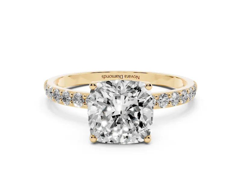 Cushion Cut Diamond Solitaire Engagement Ring Set in Yellow gold with Round Pavé Band and Prong Setting