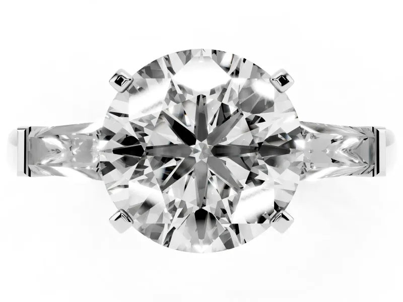 Round Cut Diamond Solitaire Ring Set in Platinum with Tapered Baguette Side Stones and Prong Setting