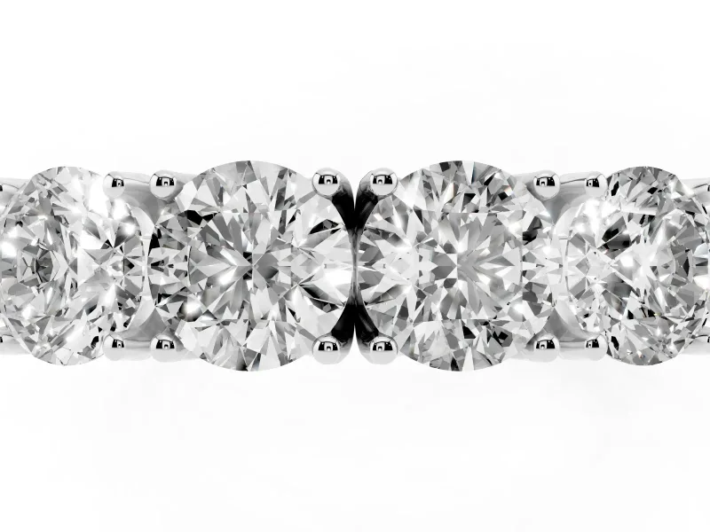 Four-Stone Round Diamond Band Set in Platinum with Prong Setting