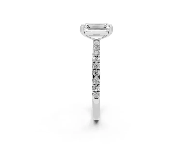 Emerald Cut Diamond Brilliant Solitaire Set in White gold with Pavé Band and Claw Prong Setting