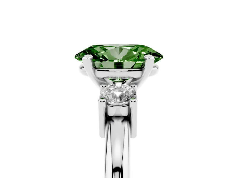Fancy Green Three-Stone Oval Cut Diamond Ring Set in White gold with Prong Setting and Plain Band