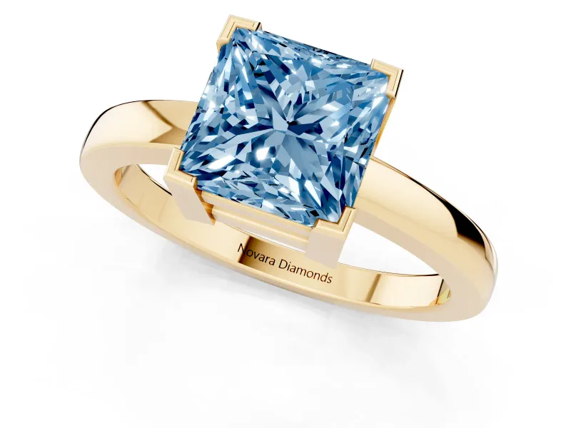Fancy Blue Princess Cut Diamond Solitaire Ring Set in Yellow gold with Prong Head and Smooth Polished Band