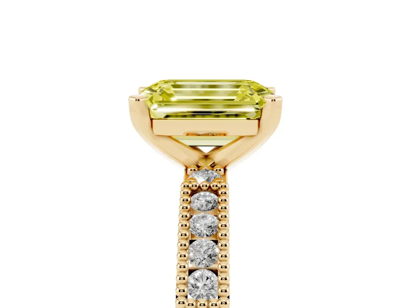 Fancy Yellow Emerald Cut Diamond Solitaire Ring Set in Yellow gold with Slim Pavé Band and Prong Setting