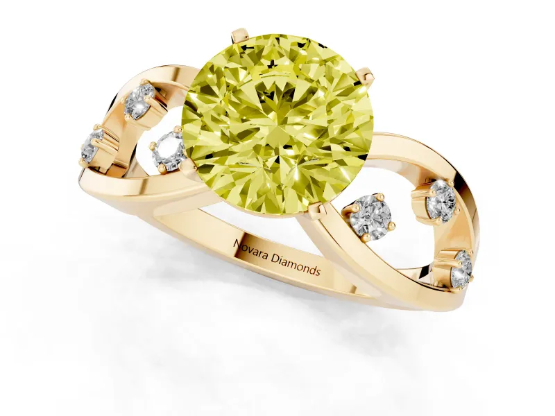 Fancy Yellow Round Cut Diamond Solitaire Ring Set in Yellow gold with Side Stones on Criss-Cross Band and Prong Setting