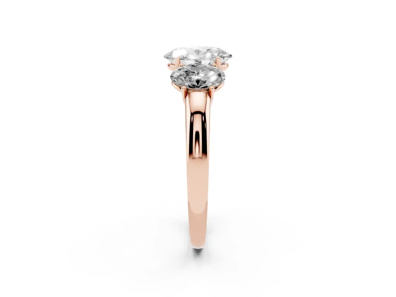 Oval Cut Diamond Three-Stone Ring Set in Rose gold with Bold Center and Classic Band