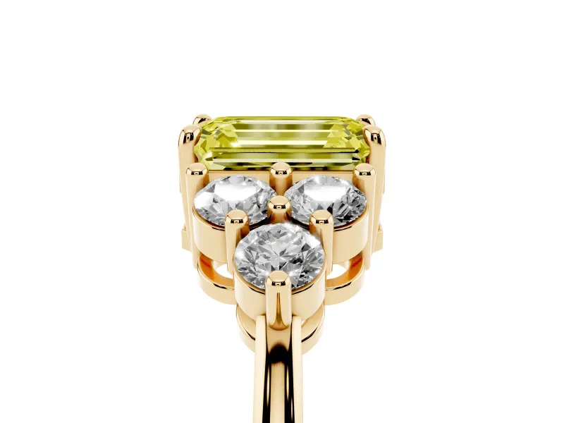 Fancy Yellow Emerald Cut Diamond Solitaire Ring Set in Yellow gold with Cluster Accents on Each Side