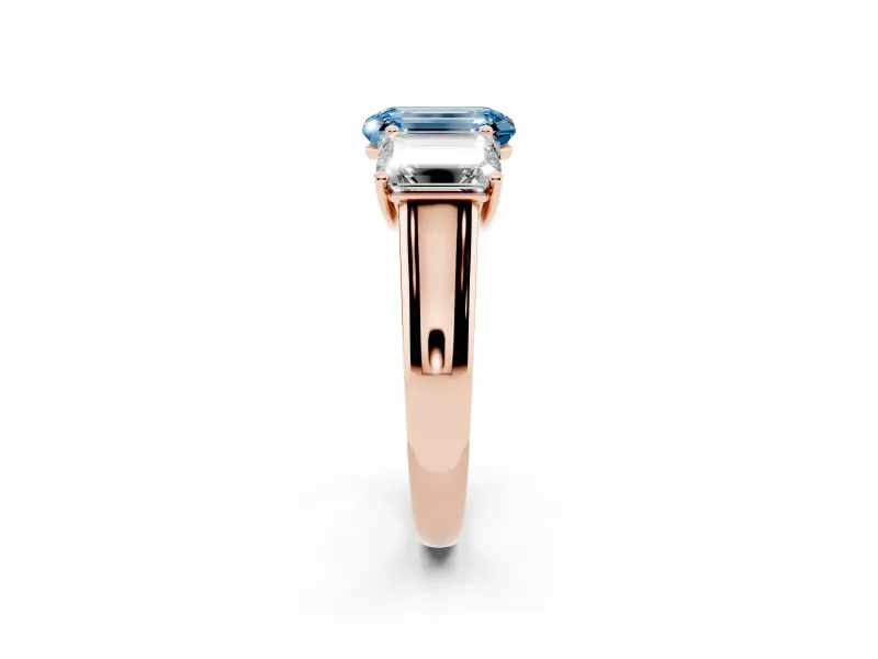 Emerald Cut Three Stone Engagement Ring Setting for a Fancy Blue Lab-Grown Diamond | Basket Prong Heads | Rose Gold