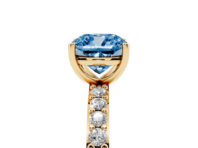 Fancy Blue Cushion Cut Diamond Solitaire Set in Yellow gold with Round Pavé Band and Prong Setting