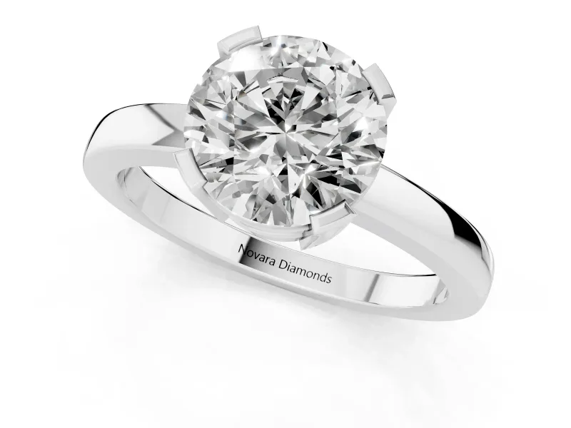 Round Cut Diamond Solitaire Ring Set in Platinum with Prong Head and Smooth Polished Band