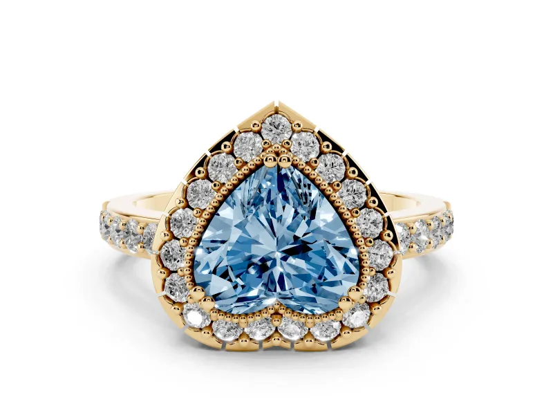 Fancy Blue Heart Cut Diamond Halo Ring Set in Yellow gold with Pavé Shank and Prong Setting