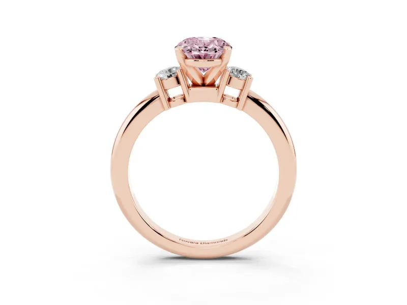 Fancy Pink Three-Stone Oval Cut Diamond Ring Set in Rose gold with Prong Setting and Plain Band
