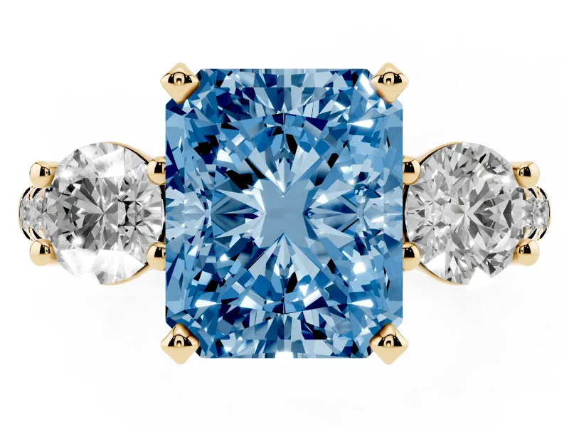 Fancy Blue Three-Stone Radiant Cut Diamond Pavé Band Ring Set in Yellow gold with Prong-Set Trio