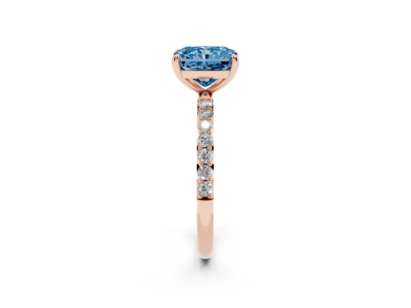 Fancy Blue Radiant Cut Diamond Solitaire Ring Set in Rose gold with Round Pavé Band and Prong Setting