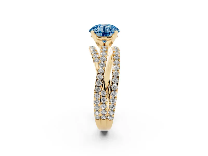 Fancy Blue Round Cut Diamond Solitaire Twist Band Ring Set in Yellow gold with Pavé Setting and Prong Head