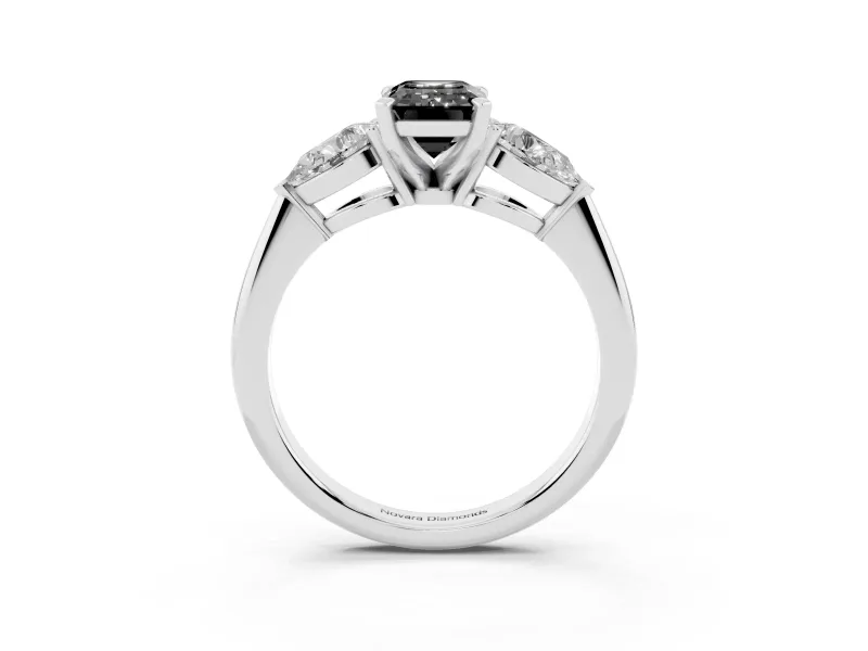 Fancy Black Three-Stone Emerald Cut Diamond Ring Set in Platinum with Pear Side Stones and Prong Setting