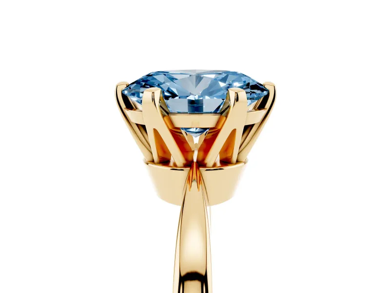 Fancy Blue Oval Cut Diamond Solitaire Engagement Ring Set in Yellow gold with Slim Tapered Solitaire Band