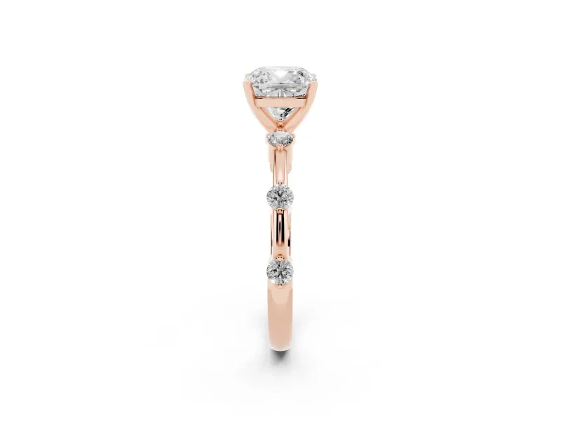 Cushion Cut Diamond Solitaire Ring Set in Rose gold with Bezel Set Side Stones and Prong Setting