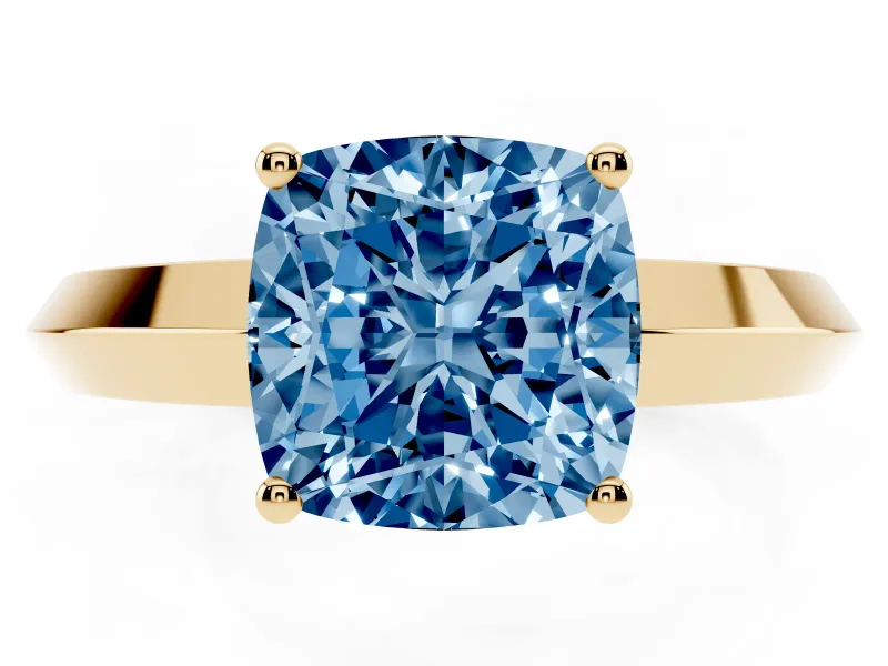 Fancy Blue Cushion Cut Diamond Solitaire Engagement Ring Set in Yellow gold with Flat Band and Prong Setting