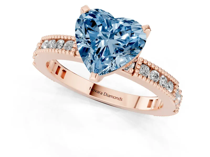 Fancy Blue Heart Cut Diamond Solitaire Ring Set in Rose gold with Slim Pavé Band and Prong Setting