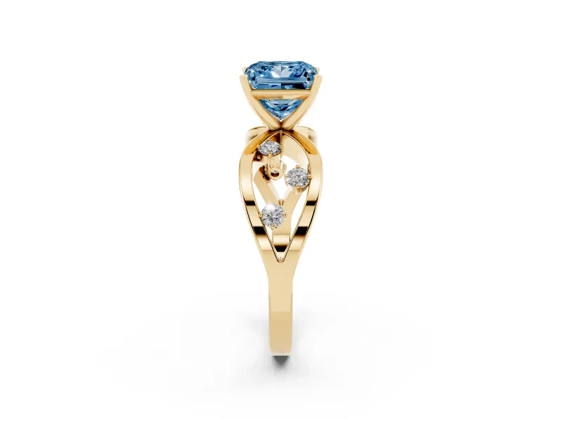Fancy Blue Princess Cut Diamond Solitaire Ring Set in Yellow gold with Side Stones on Criss-Cross Band and Prong Setting