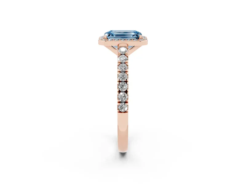 Fancy Blue Emerald Cut Diamond Halo Engagement Ring Set in Rose gold with Pavé Band and Prong Setting