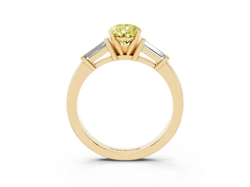 Fancy Yellow Pear Cut Diamond Solitaire Ring Set in Yellow gold with Tapered Baguette Accents and Prong Setting