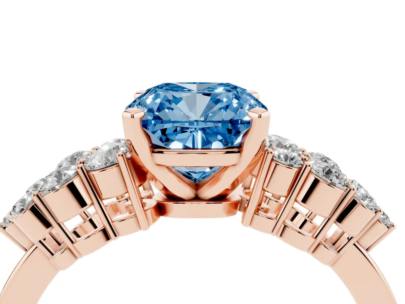Fancy Blue Cushion Cut Diamond Cluster Engagement Ring Set in Rose gold with Pavé Band and Prong Setting